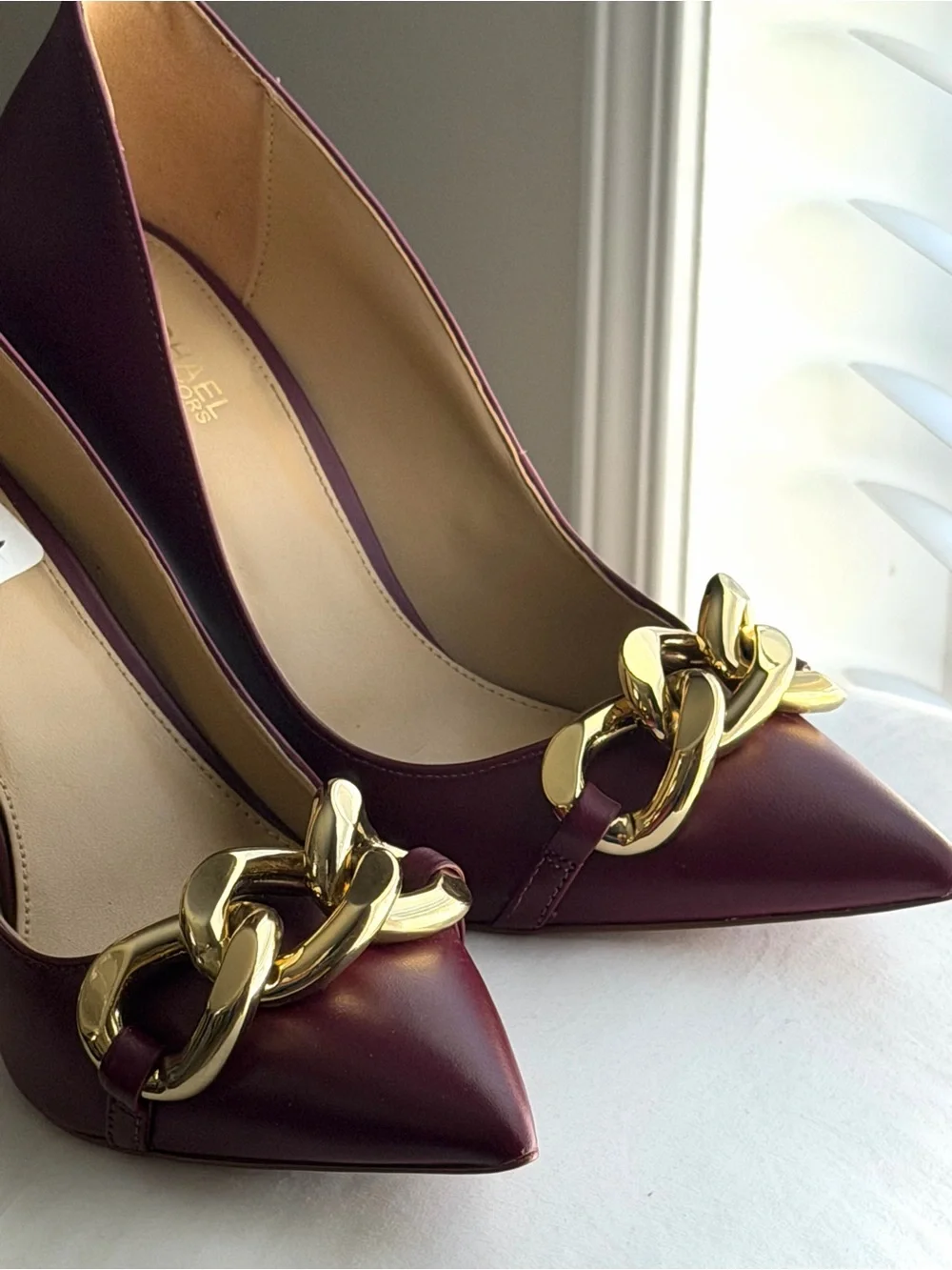 Michael Kors Burgundy Pointed Toe Pumps with Gold Chain Accent